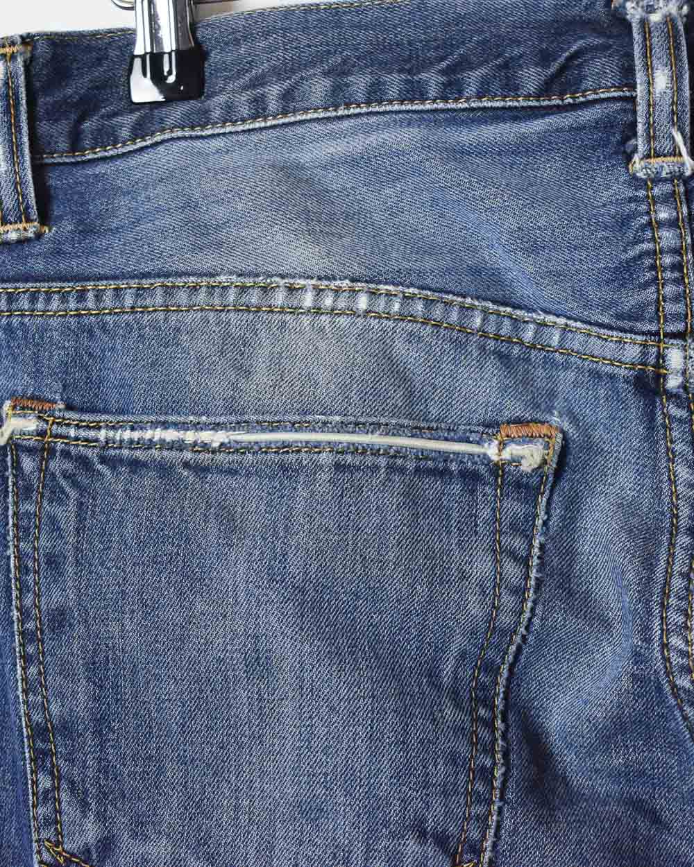 Navy Carhartt Jeans - W34 L33