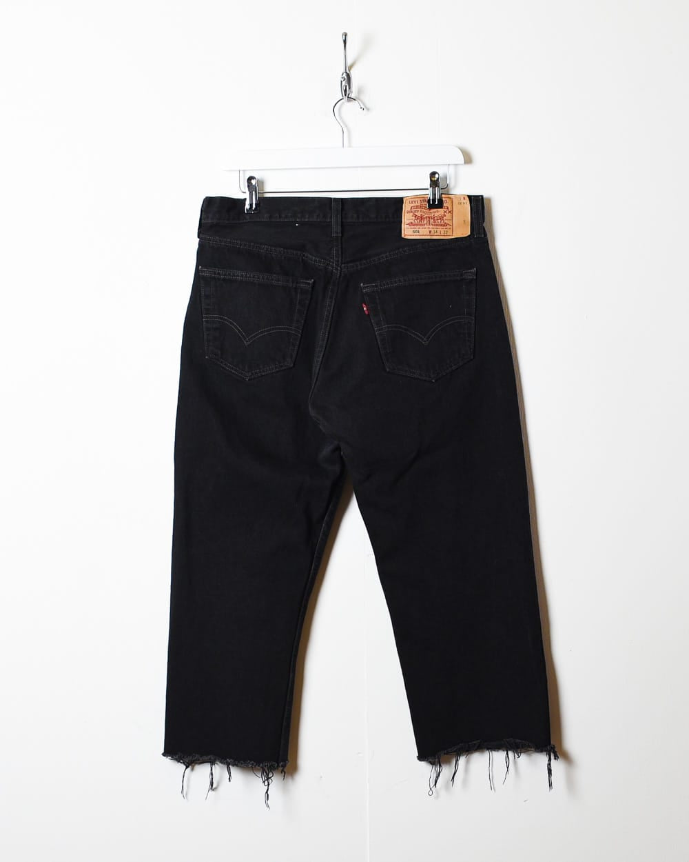 Black cut off jeans best sale