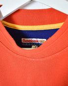 Orange Reebok Women's Freestyle T-Shirt - Large