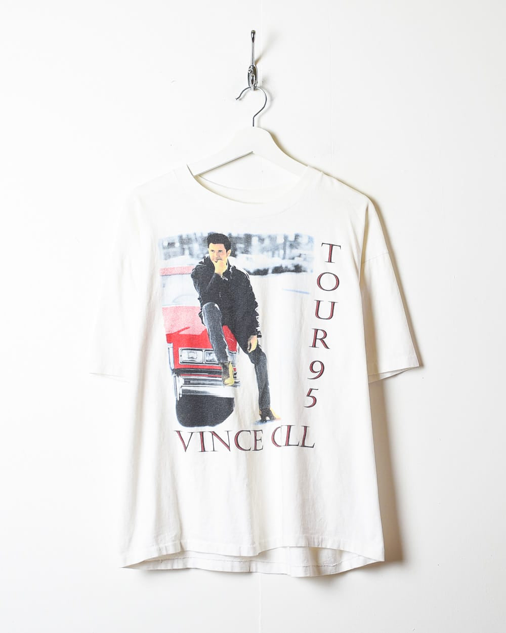 https://domno-vintage.com/cdn/shop/products/67-Vintage-Vince-Gill-Tour-1995-Single-Stitch-T-Shirt1.jpg?v=1688207376&width=1000